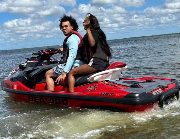 couple on red rxt 325hp jetski on tampa waters